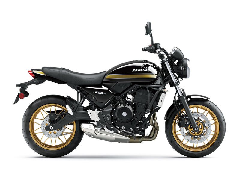 Load image into Gallery viewer, A black Kawasaki Z650R motorcycle with gold accents on the wheels, tank stripe, and engine details, shown from a side profile on a white background.