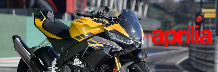 New Yamaha XSR900 GP sport motorcycle available at Cyclespot New Zealand, shown riding through an urban landscape with retro red and white styling.