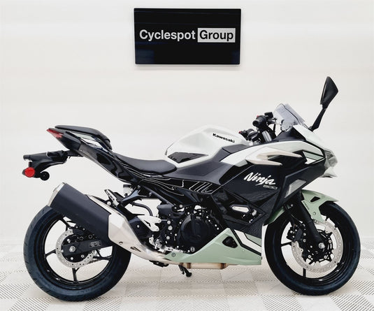 Kawasaki Ninja 500 LAMS motorcycle on a white background with 'Cyclespot Group' branding.
