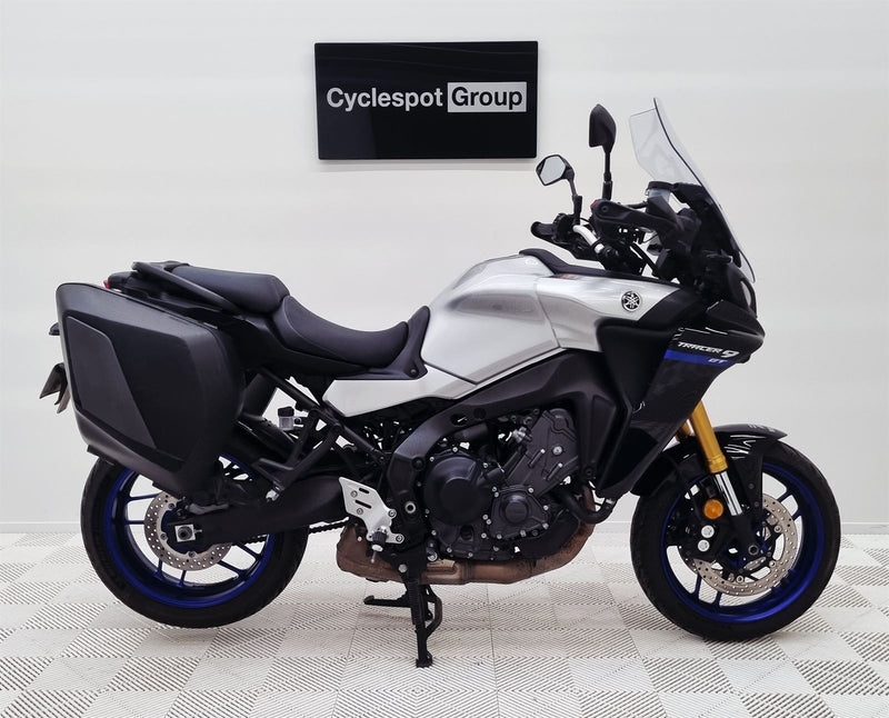 Load image into Gallery viewer, 2021 Yamaha Tracer 9 GT motorcycle on display with 'Cyclespot Group' sign in the background
