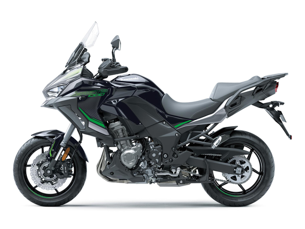 Load image into Gallery viewer, A black 2024 Kawasaki Versys 1000 S adventure-touring motorcycle with green accents, shown from a side profile view against a solid white background.
