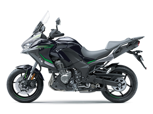A black 2024 Kawasaki Versys 1000 S adventure-touring motorcycle with green accents, shown from a side profile view against a solid white background.