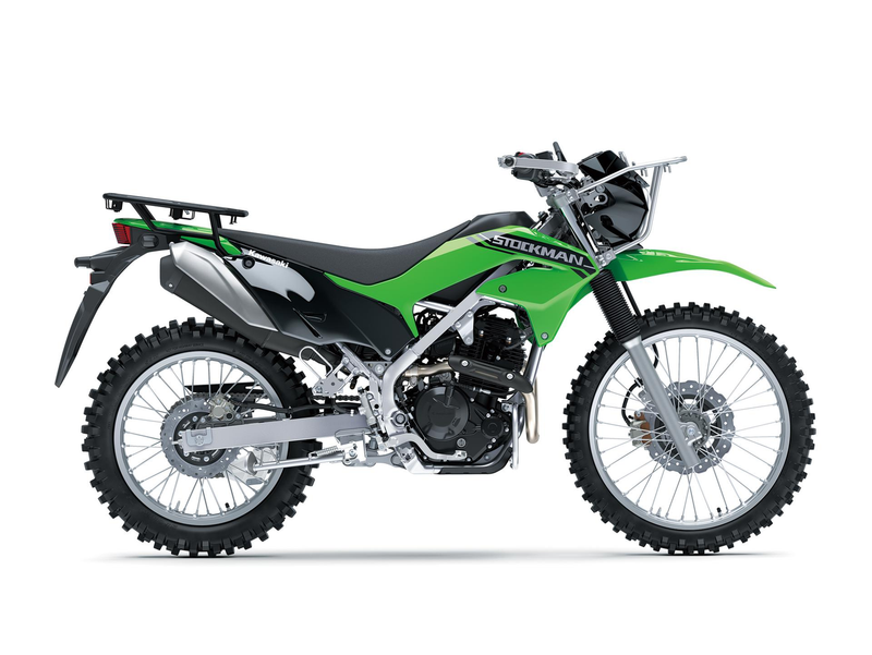 Load image into Gallery viewer, A green and black Kawasaki Stockman dirt bike with silver metal components, photographed from a side profile against a solid white background.
