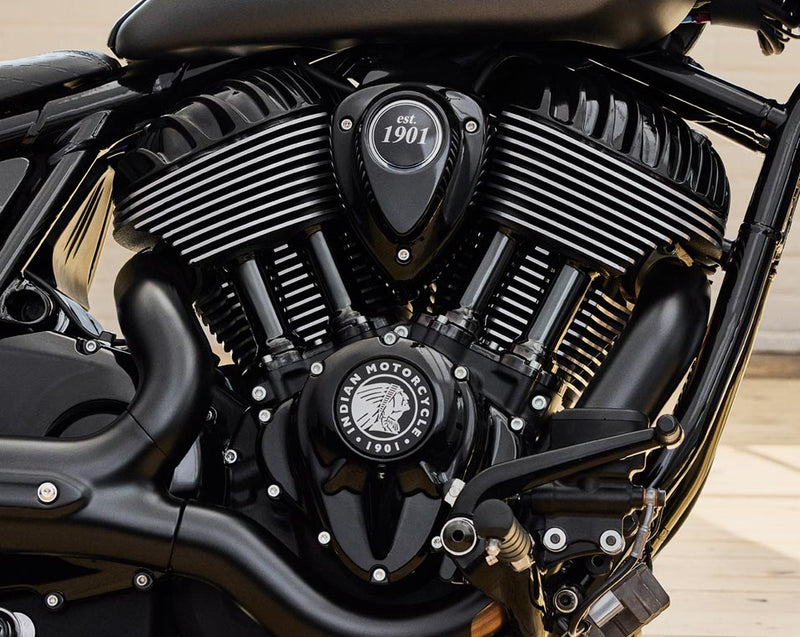 Load image into Gallery viewer, Close-up of a black Indian Motorcycle V-Range engine with chrome accents and the brand logo visible on the cover.
