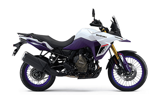 Load image into Gallery viewer, 2026 Suzuki V-Strom 800 DE Adventure motorcycle in a white and purple color scheme, shown from a side profile on a clean white background.
