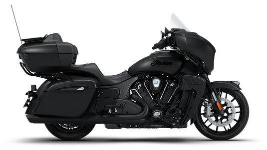 A black 2026 Indian Roadmaster Dark Horse touring motorcycle with saddlebags, a windshield, and a top case, shown in a side profile on a white background.